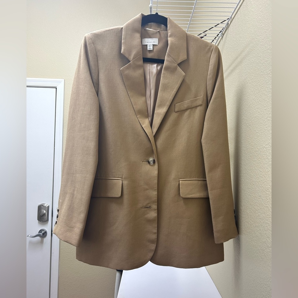 Topshop camel boyfriend blazer. Never worn. Extra buttons packet still attached